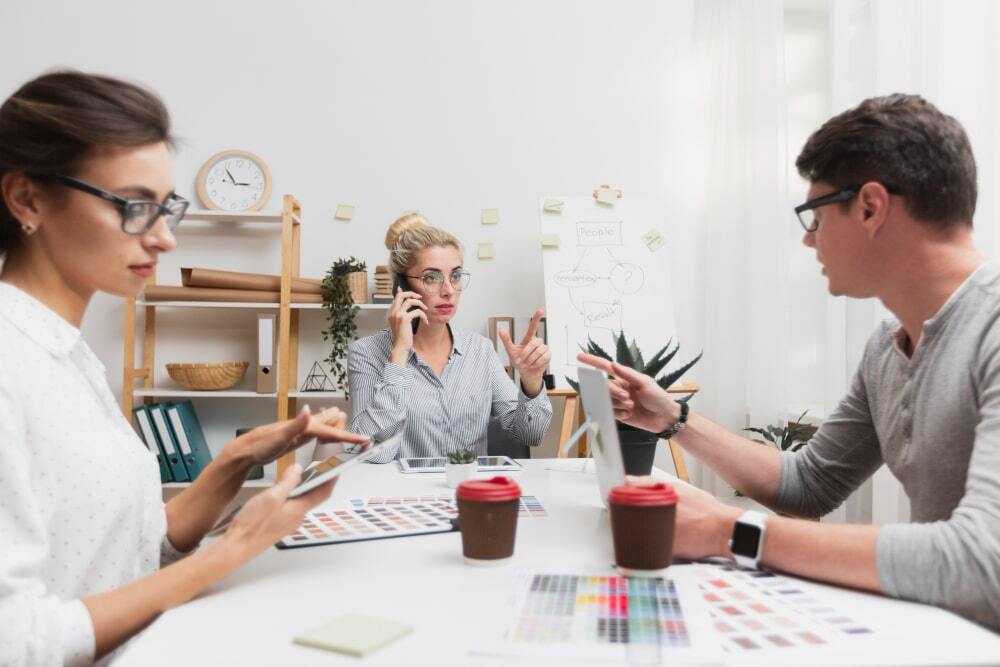 Why 3D Letters for Wall Are the Ultimate Statement Piece for Your Office or Store 1 (A team discussing all the benefits of branding and why they should use 3d wall letters)