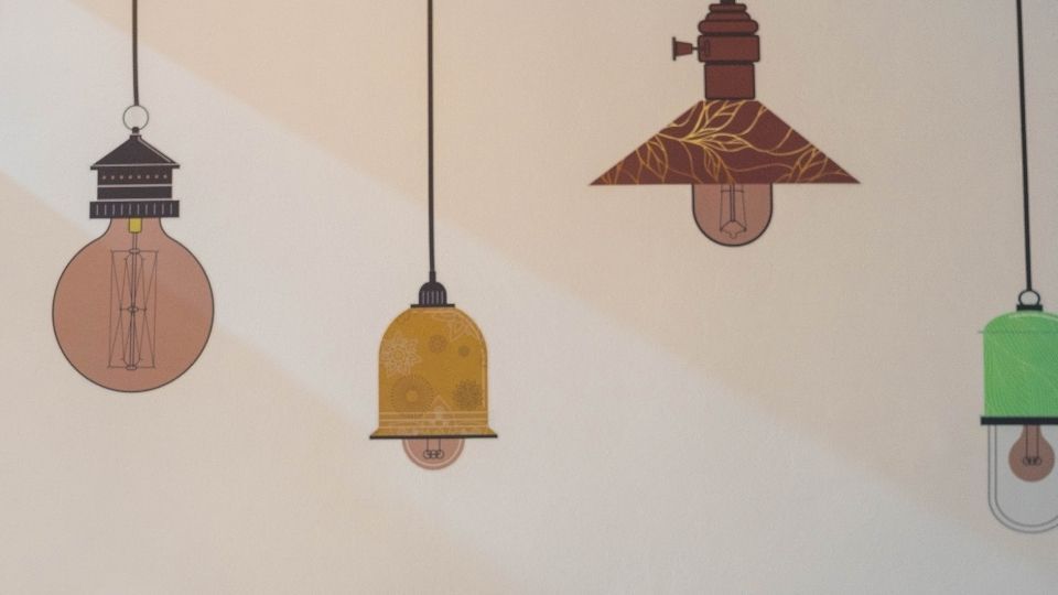 5 Sign Products to Revamp Your Interior for Any Budget 4 (An image showcasing wall graphics of bulbs to make it look visually impactful)