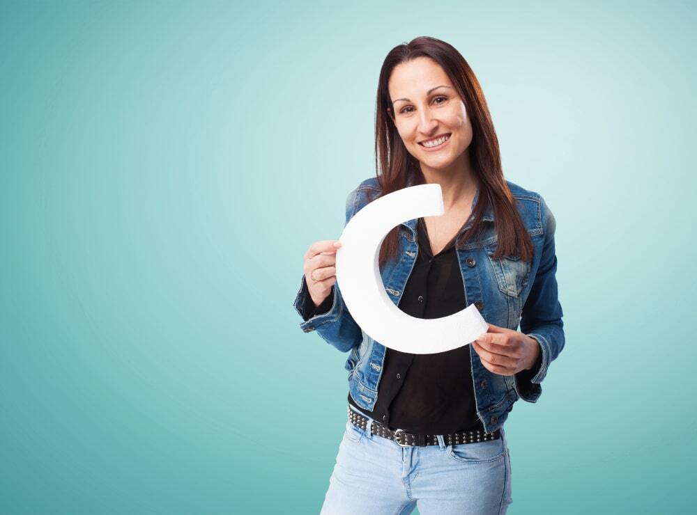 What Are 3D Sign Letters and Why Are They Popular? 9 (A woman can be seen holding a 3D sign letter in her hands)