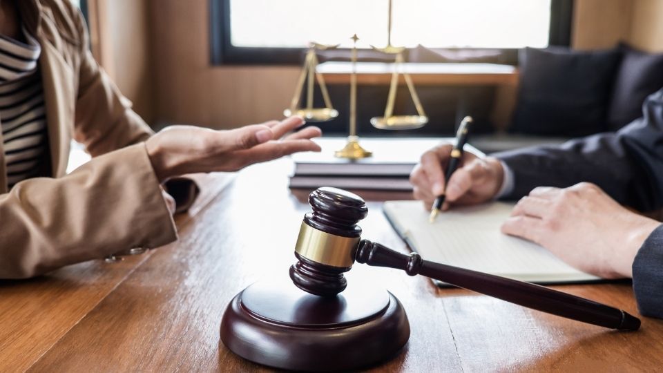 (In the image you can see a client having their first consultation with her solicitor)