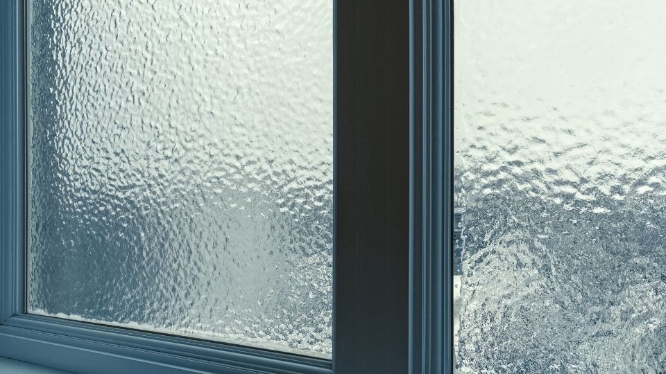 The Comprehensive Guide to Window Frosting: Enhancing Privacy, Style, and Functionality 3 (In the image a window frosting design can be seen enhancing privacy and showcasing a stylish look)