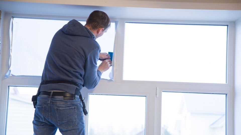 (You can see a person fitting in a frosted window into a panel)