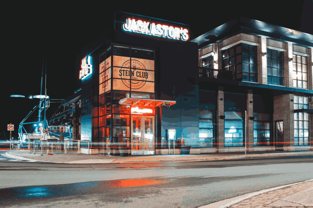 Outdoor Neon Signs Installation Guide: for Different Displaying Methods 5 (This image is showing an Outdoor neon sign on front of a store)