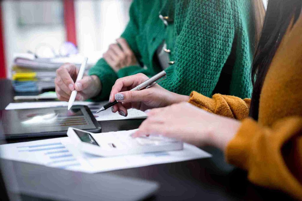 A tax consultant is performing VAT Registration.