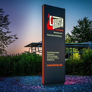 Illuminated outdoor totem sign for business branding
