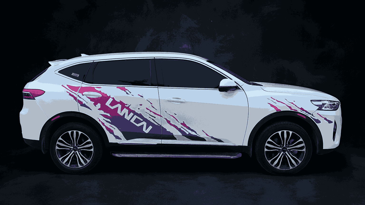 A car is wraped and displayed