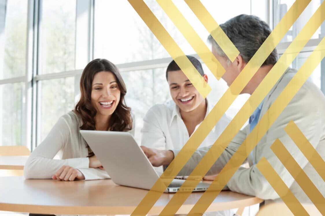 (A happy couple discussing partner visa UK requirements and application strategies with an immigration solicitor on a laptop.)