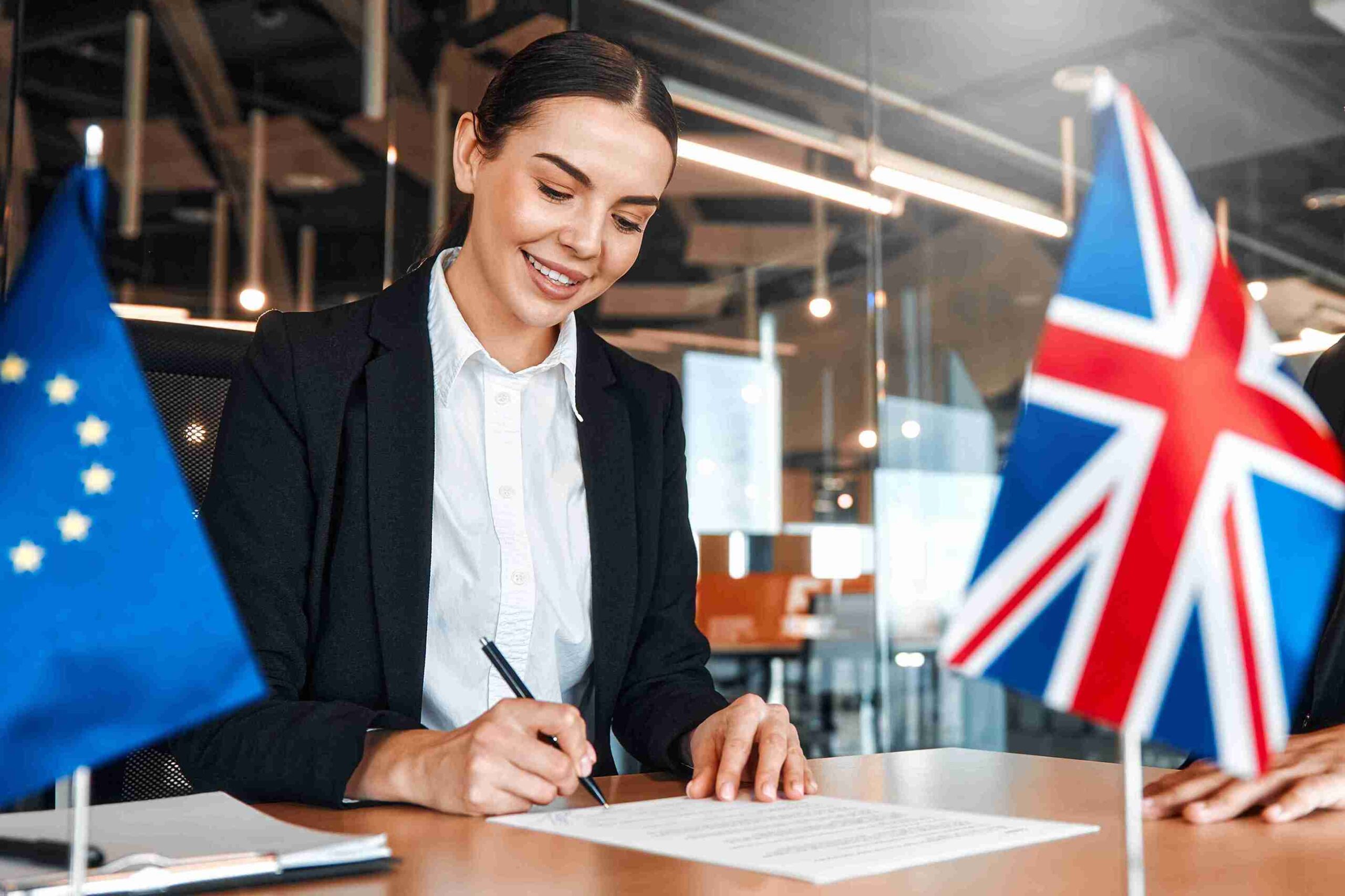 UK sign post-Brexit trade deal, highlighting new visa fee waiver application process for travelers.