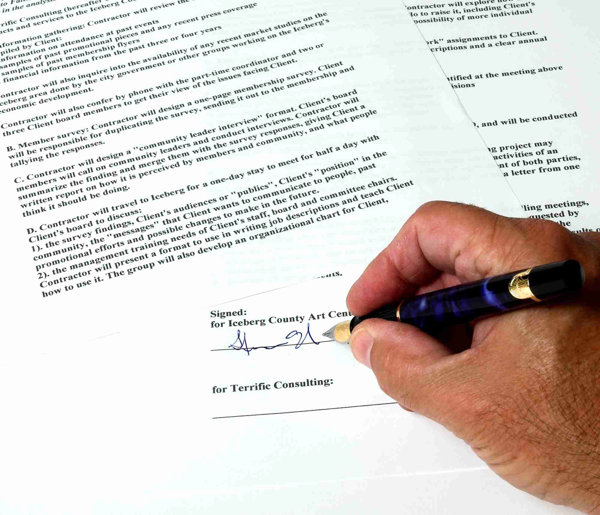 Hand signing legal document with blue pen, representing authority covering financial, property, and personal welfare