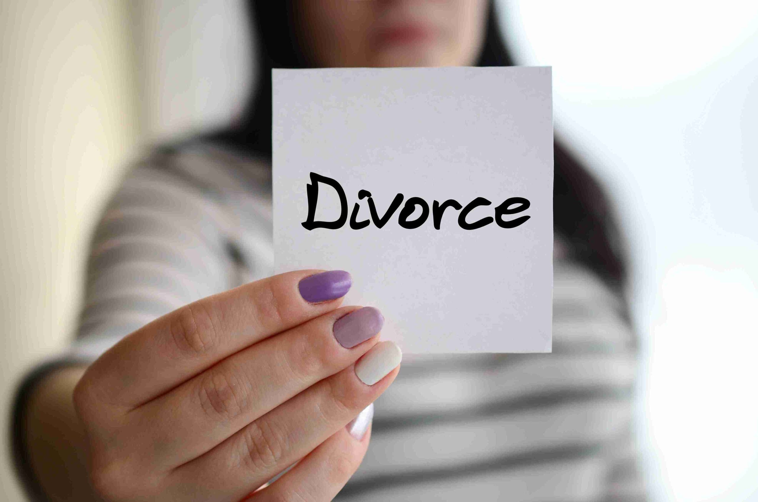 Image depicting the concept of divorce in the United States, highlighting legal documents and emotional aspects of separation.