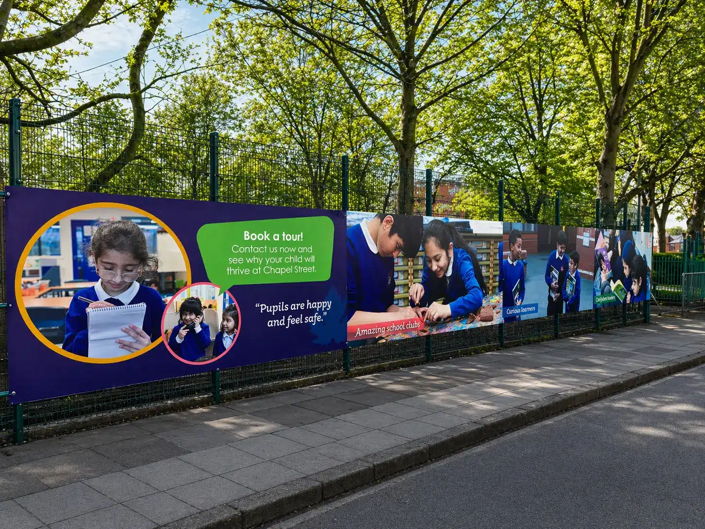 A large banner featuring smiling children, showcasing diversity and joy in a vibrant design.