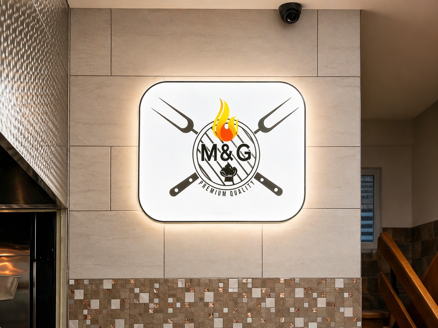 . Logo of M & G Restaurant displayed prominently in a vibrant kitchen setting, showcasing a blend of culinary creativity.