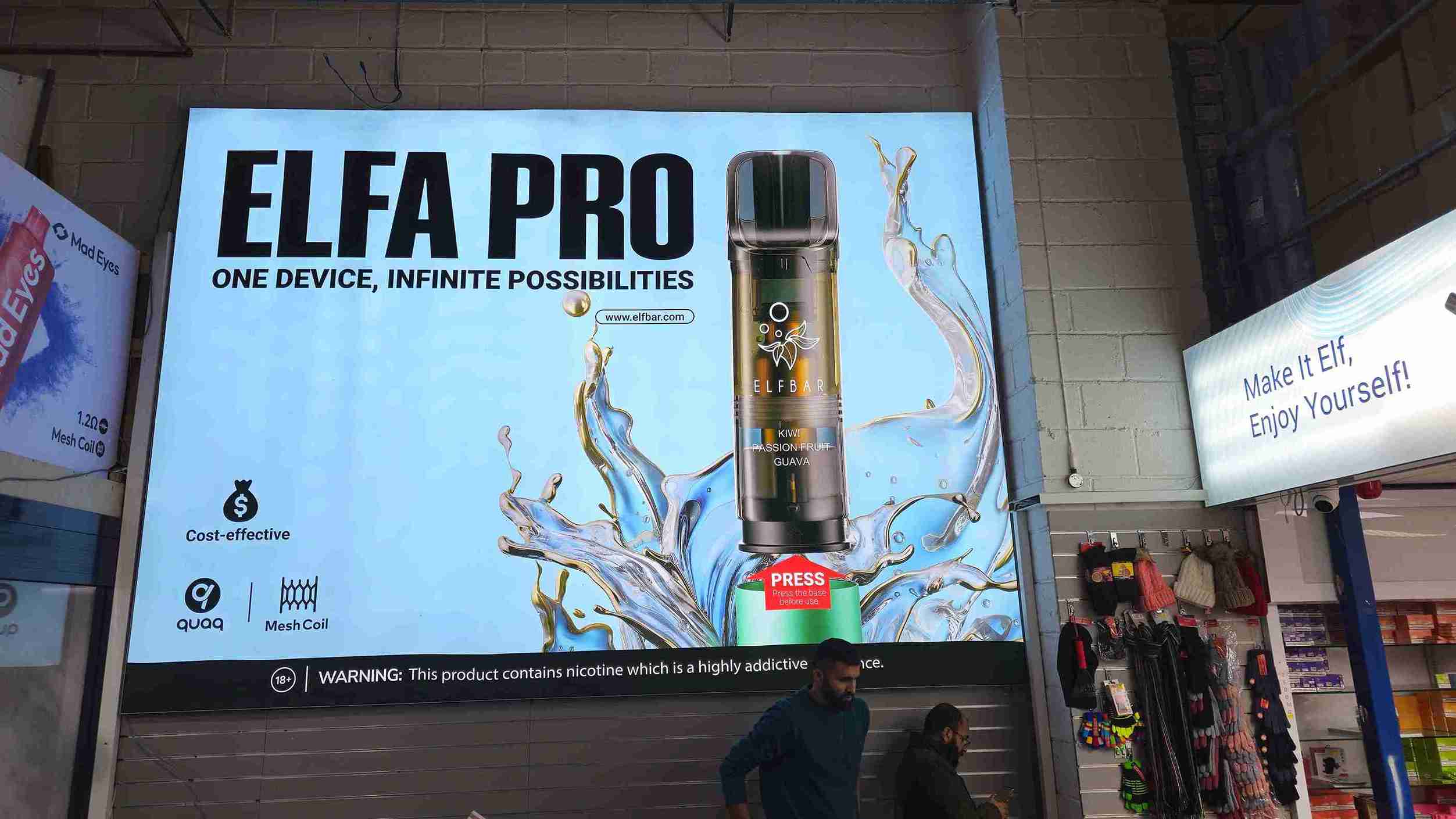A large screen displays an image of an elfa pro bottle, showcasing its sleek design and branding.