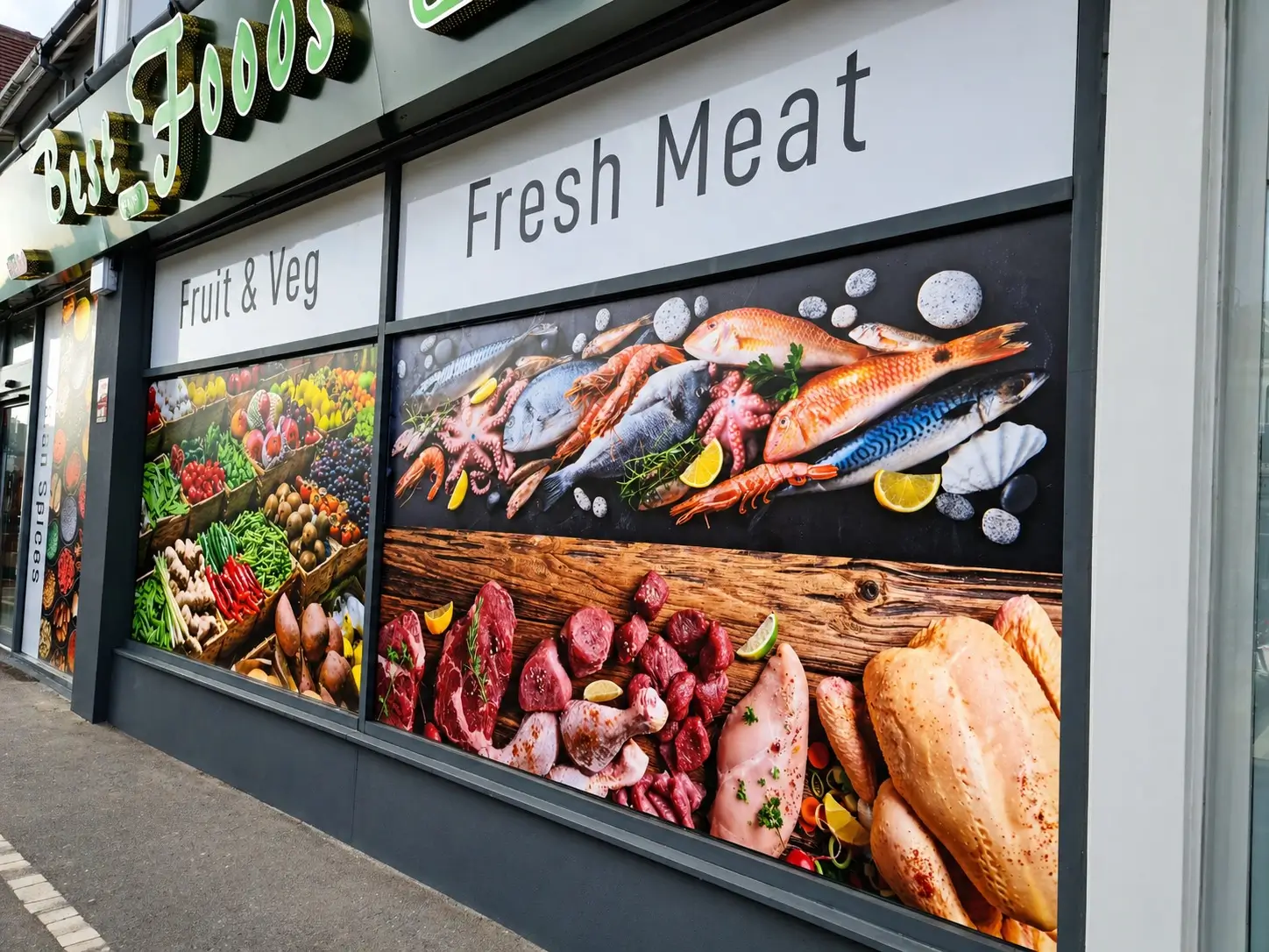 Storefront featuring a large sign that reads "Fresh Meat" prominently displayed above the entrance.